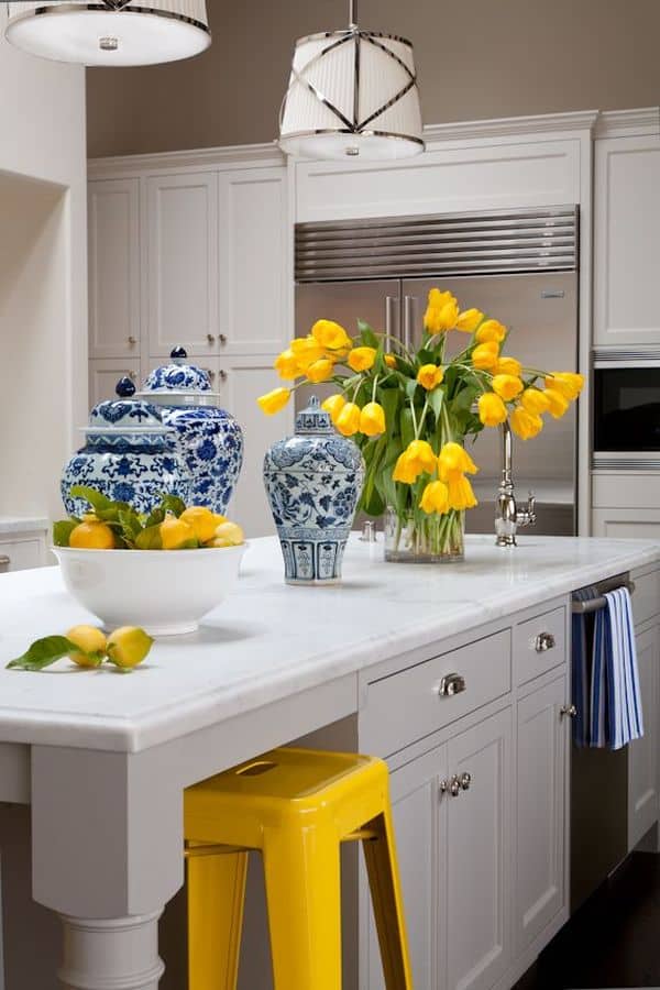 Yellow accents in a white kitchen