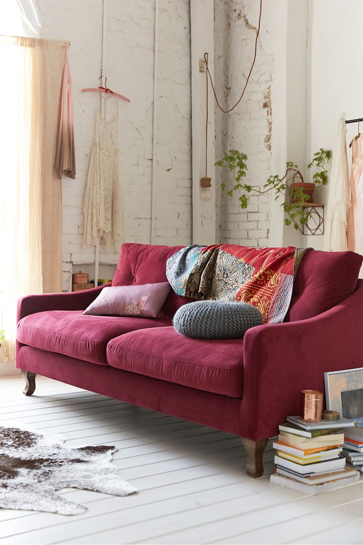 dark-pink-sofa-and-whitewashed-brick-walls