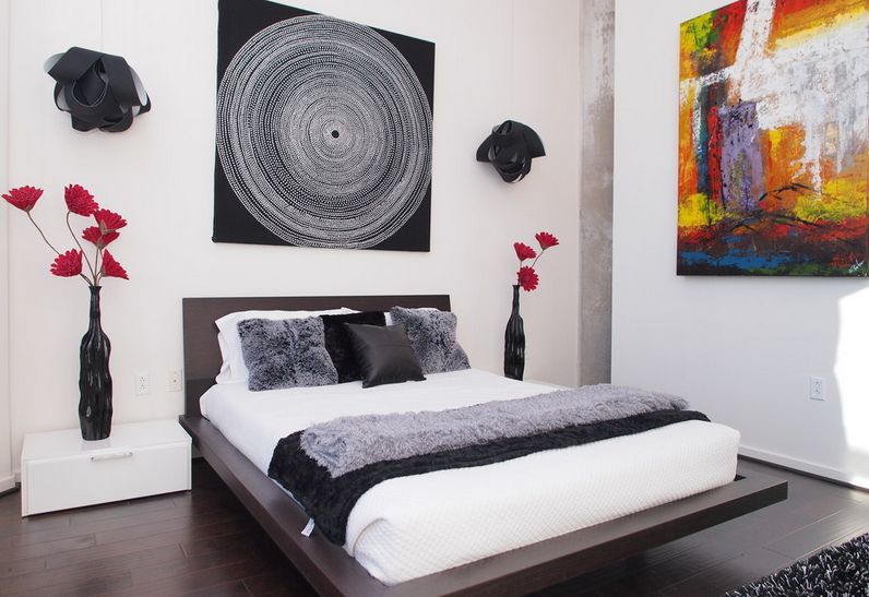 Bedroom walls decorated with canvas art