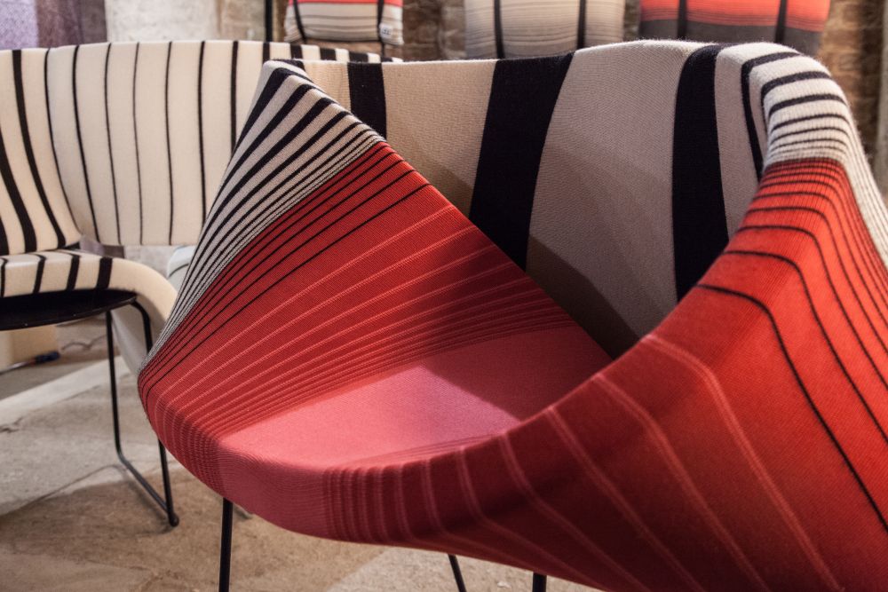 The vertical stripes highlight the geometry of these sofas in a really cool and elegant manner