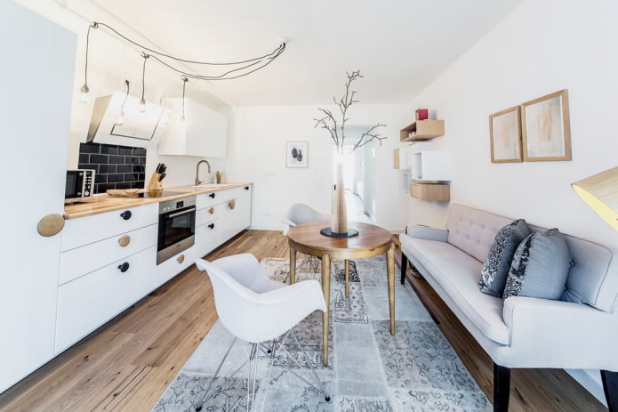 диван в интерьере кухни в скандинавском стиле