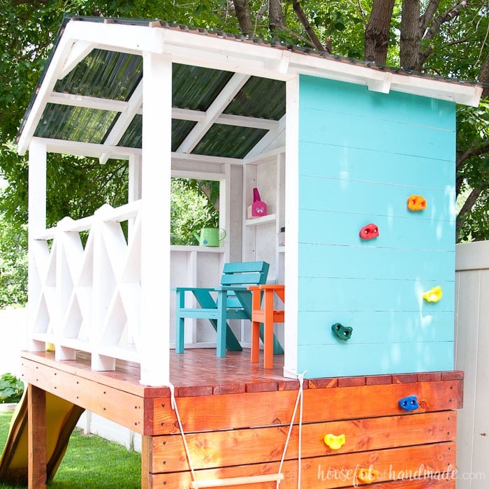 Turn your tiny backyard into an adventure with this DIY wooden outdoor playhouse! The entire build process is shared on Housefulofhandmade.com