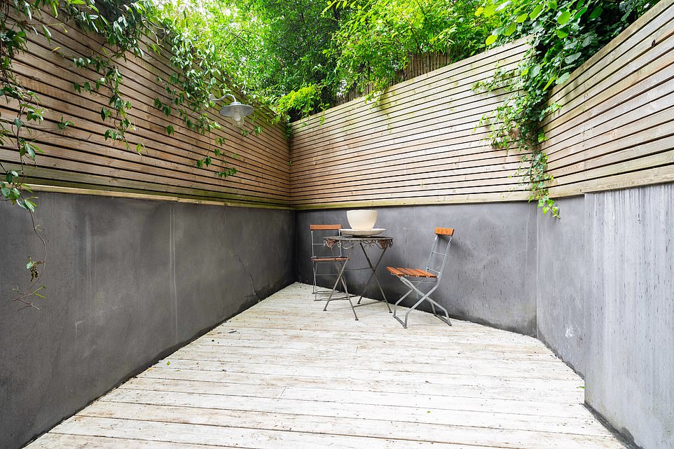 A small patio area in the garden makes an ideal place to sit and chat with family and friends in the sunshine, particularly during the lockdown period