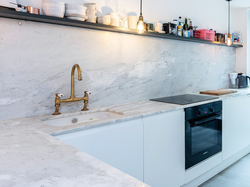 The two-storey property in East Dulwich, south London, was converted from a derelict workshop to create 570sq ft of living space - and is available to buy for £700,000