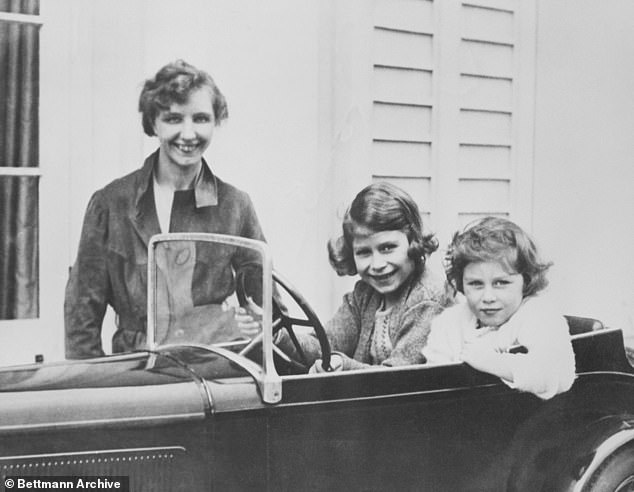Devoted: Crawfie is pictured above with Elizabeth and Margaret in a miniature car. The trial month became 17 years and the bond between ¿Crawfie¿, as the princess dubbed her teacher, and ¿Lilibet¿, as the governess called her pupil, came to redefine royal history