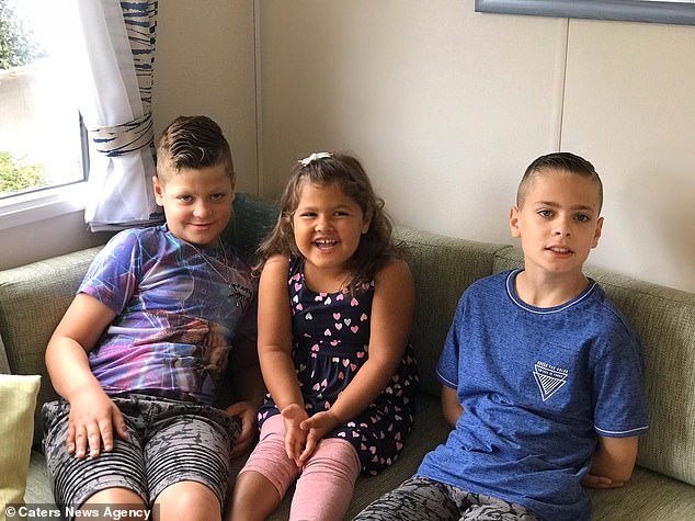 When Flossy was born, the boys just asked why she was a different colour - and Sophia told them it was because she looked more like her, while they look more like their daddy. Pictured, Flossy, Fin and Maxwell