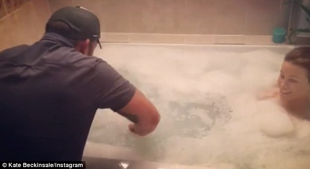 Whipping up bubbles: Taking to Instagram on Sunday, the 44-year-old actress was seen in the tub whilst revealing how bubble baths are kept fresh for the camera