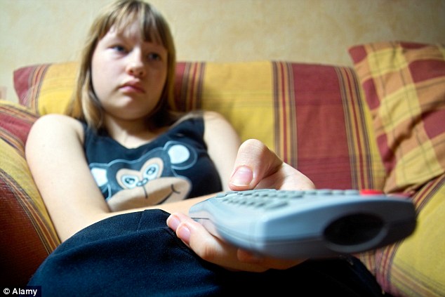 If teenagers are left alone  they revert to lazy habits - like watching TV on the sofa. Picture posed by model