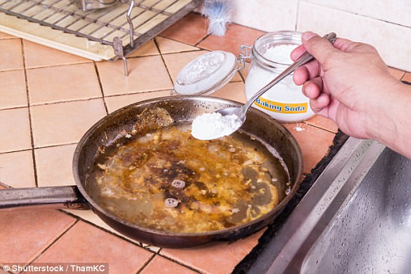 Baking soda (pictured) is one of the magic ingredients alongside vinegar that will make cleaning a burnt pan so much easier