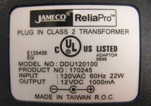 DC power supply rating label. Output is 12 VDC 1000 mA. Center Positive.