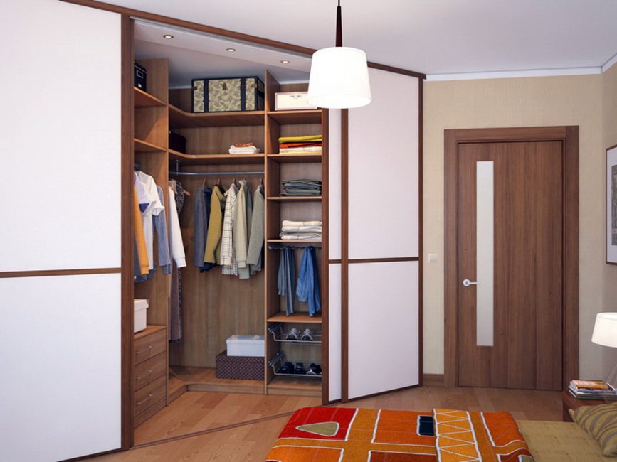 Угловой тип можно разместить как в спальне, так в гостиной – главное, правильно скрыть зону хранения одежды