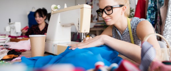 Seamstresses serve their local community with sewing services, typically working in a small independent shop where customers come in to have garments repaired or altered.