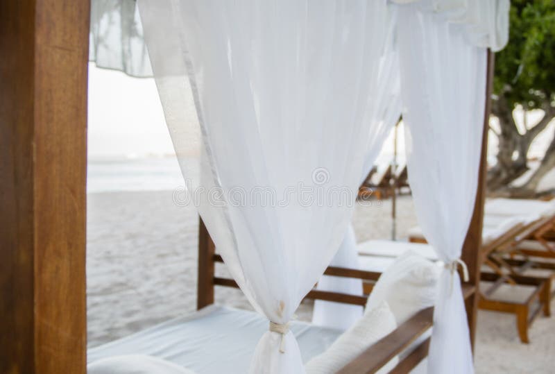 Cabana with White Curtains on a Beautiful Beach in Mexico stock images