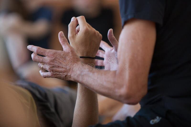 Dancer contacting hands, perform bodywork stock photo