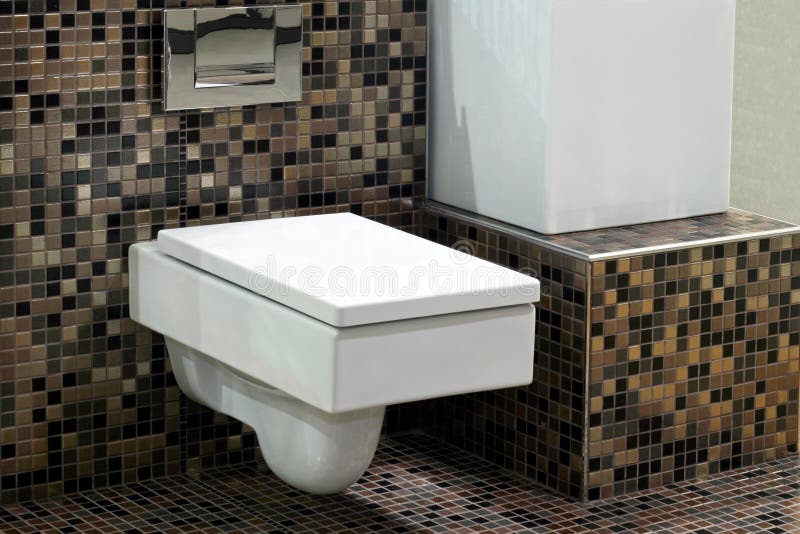 Toilet and tiles 2. Square shape of geometric toilet and brown tiles stock photos