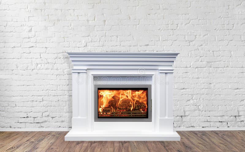 White classic fireplace in bright empty living room interior of house.  royalty free stock photo