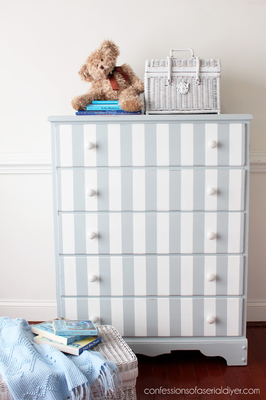 Dated dresser updated with gray stripes from confessionsofaserialdiyer.com