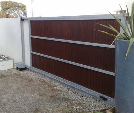 Sliding gate on a gravel driveway 