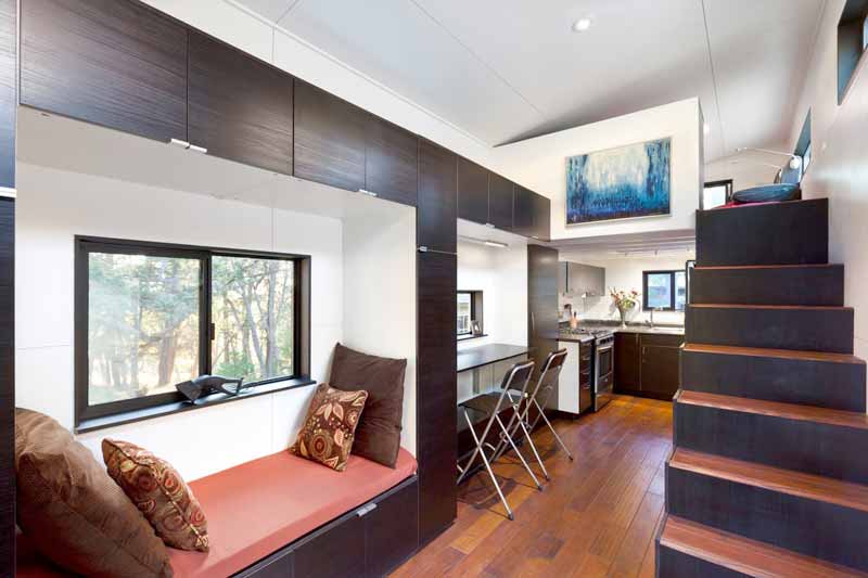 staircase and kitchen area