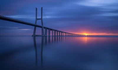вантовый мост закат море